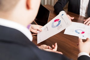 Person holding a paper